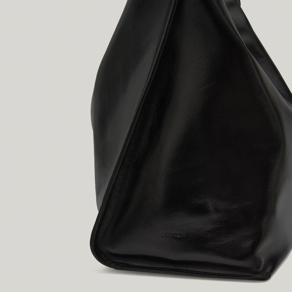 women atelier de lumen arete bag